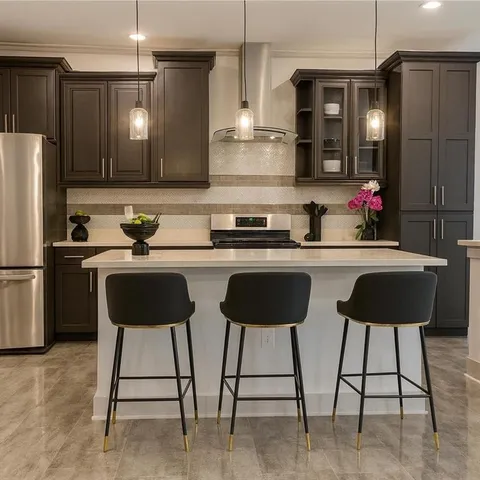 a bathroom with a tub a sink and mirror