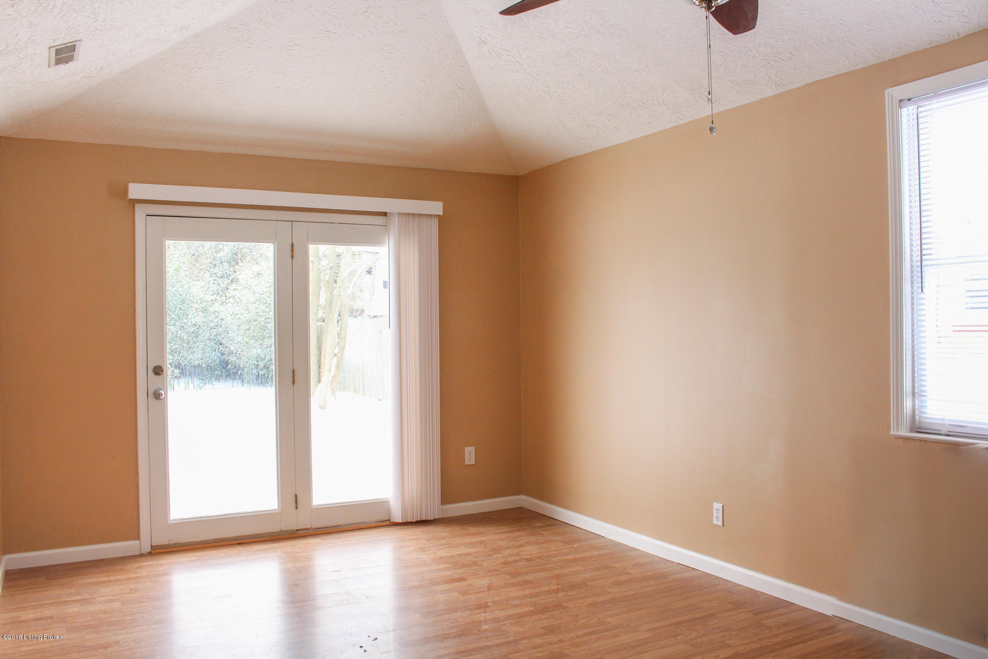 4628 Dover Road Louisville, KY 40216 - Photo 19 of 27 master bedroom leads out to patio