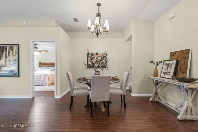 a view of a kitchen from the hallway