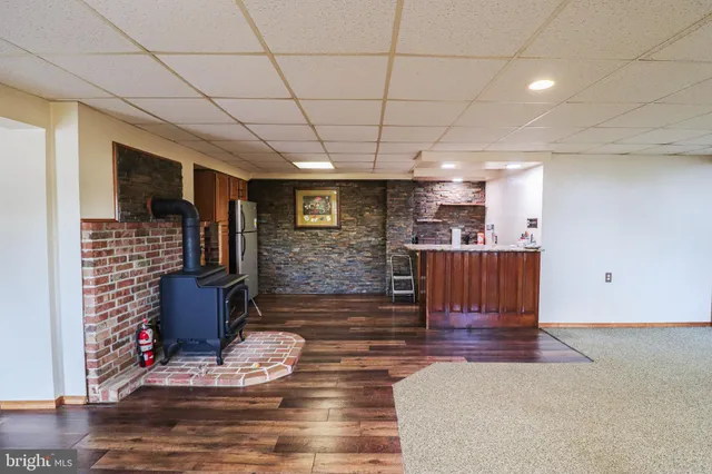 a lobby with furniture and wooden floor