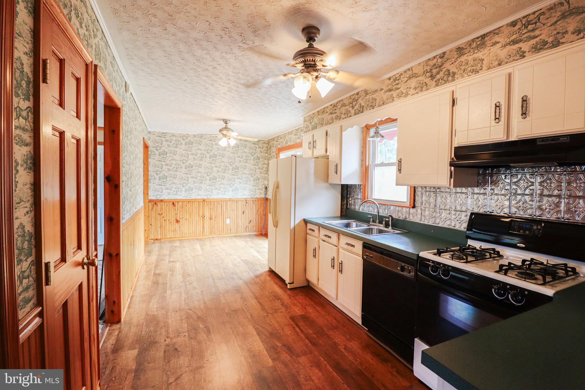170 Donrene Road Mount Wolf, PA 17347 - Photo 19 of 71 a kitchen with stainless steel appliances granite countertop a stove and a refrigerator