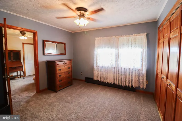 a bathroom with a sink a vanity and a mirror
