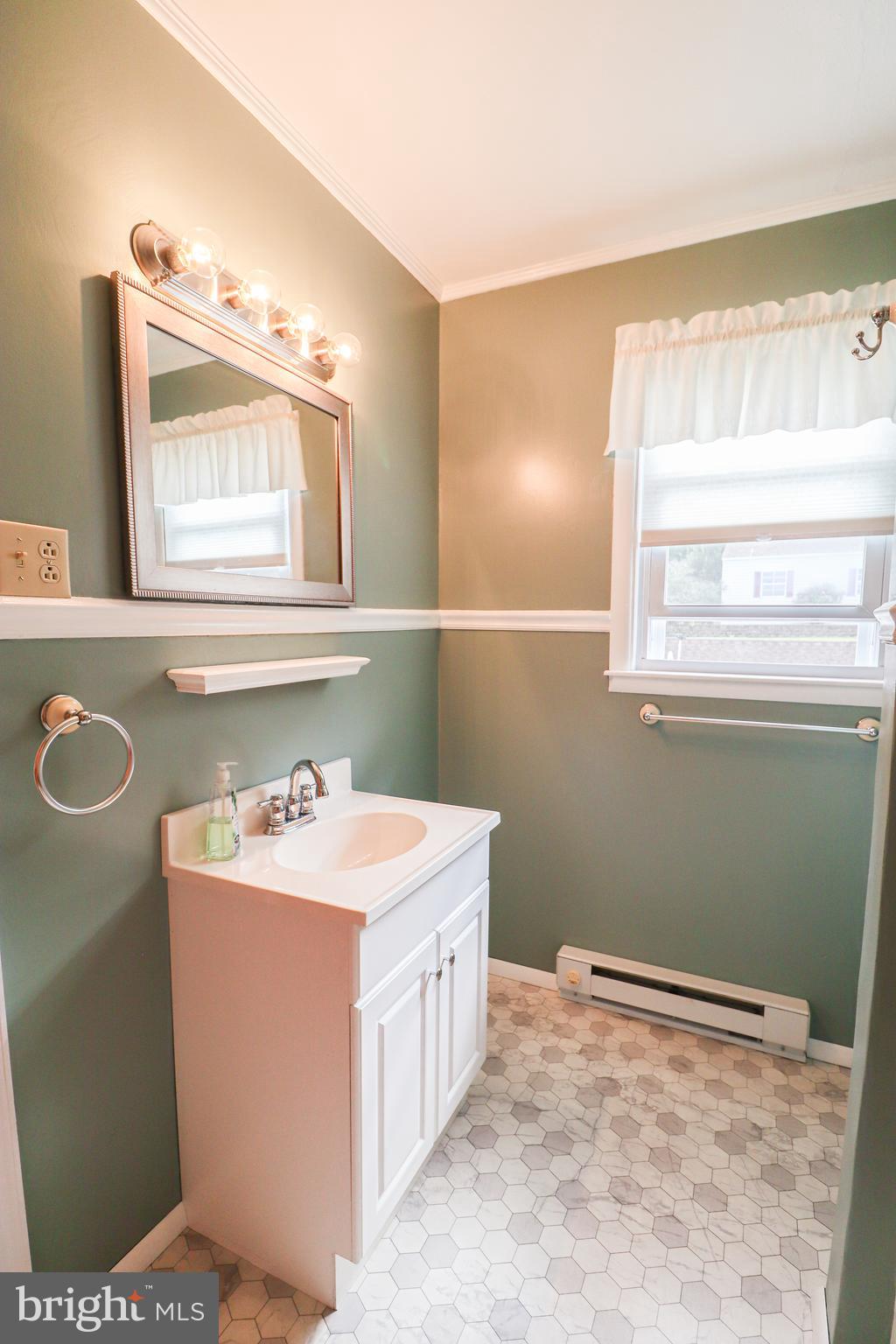 170 Donrene Road Mount Wolf, PA 17347 - Photo 27 of 71 a bathroom with a sink a vanity and a mirror