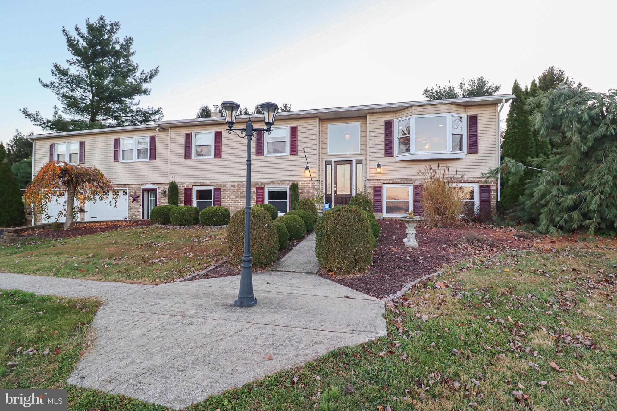 170 Donrene Road Mount Wolf, PA 17347 - Photo 3 of 71 a view of a house with backyard and trees