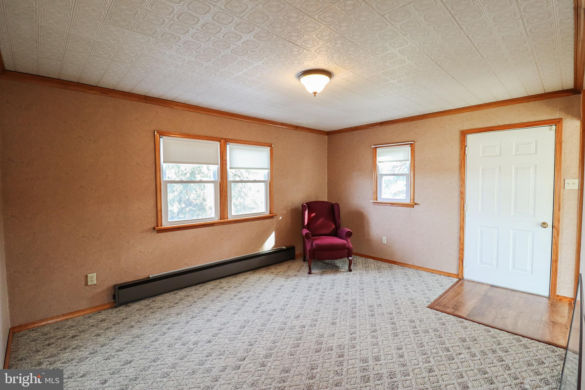 170 Donrene Road Mount Wolf, PA 17347 - Photo 31 of 71 a living room with furniture and a window