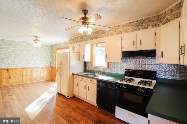 a view of a hallway with a large window