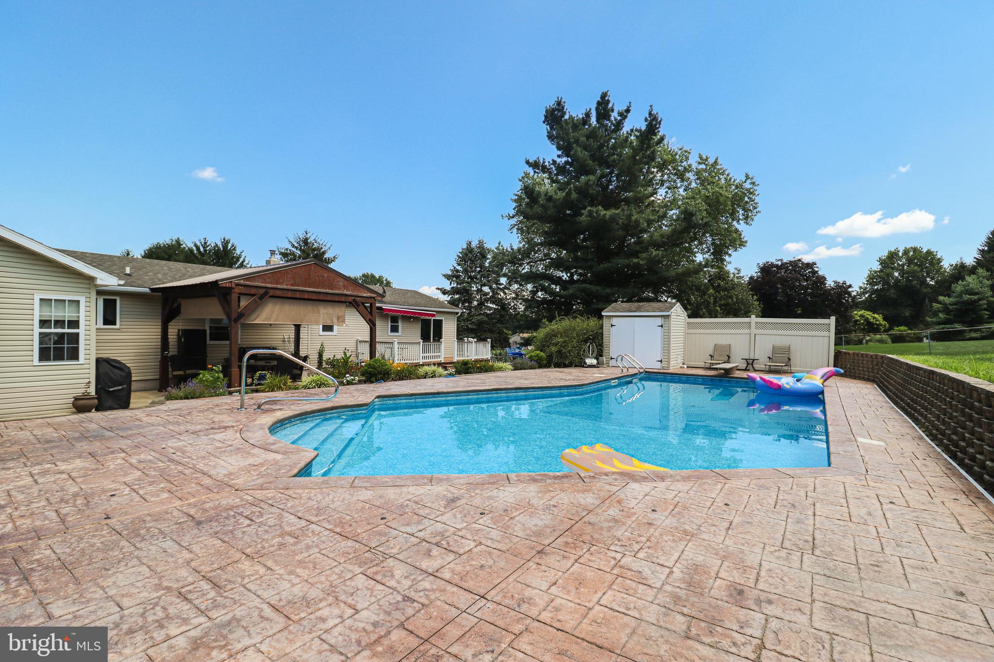 170 Donrene Road Mount Wolf, PA 17347 - Photo 42 of 71 a view of a house with pool and a yard