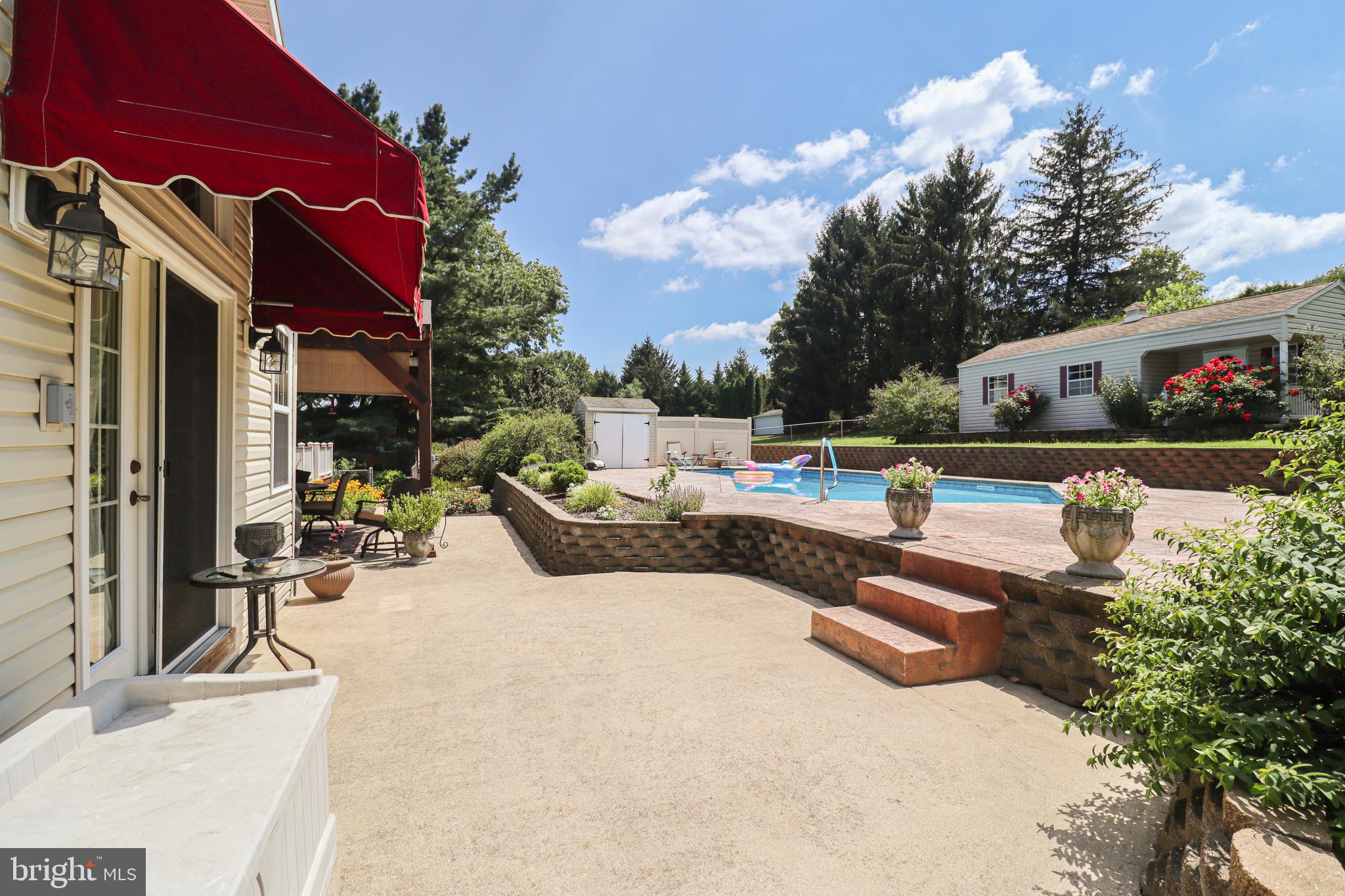 170 Donrene Road Mount Wolf, PA 17347 - Photo 45 of 71 a view of a patio with swimming pool table and chairs