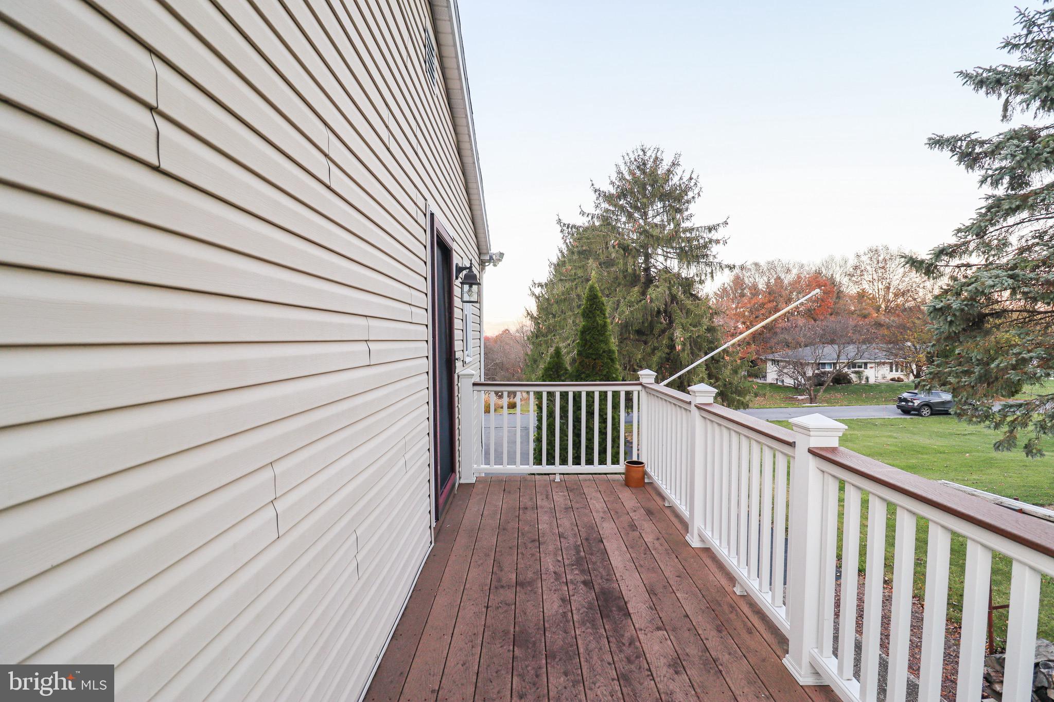 170 Donrene Road Mount Wolf, PA 17347 - Photo 58 of 71 a view of a balcony with wooden floor and fence and floor