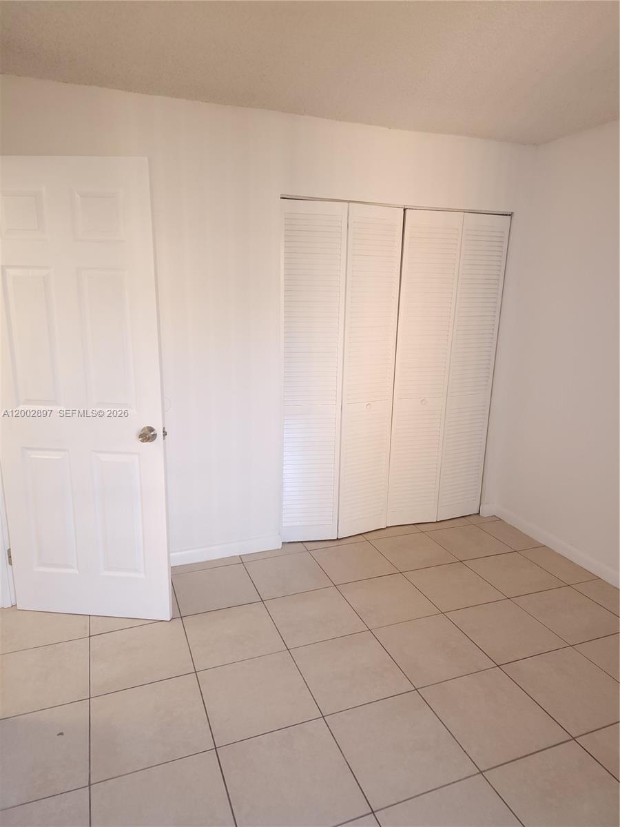 4505 Treehouse Lane, Unit 8H Tamarac, FL 33319 - Photo 16 of 29 a view of an empty room