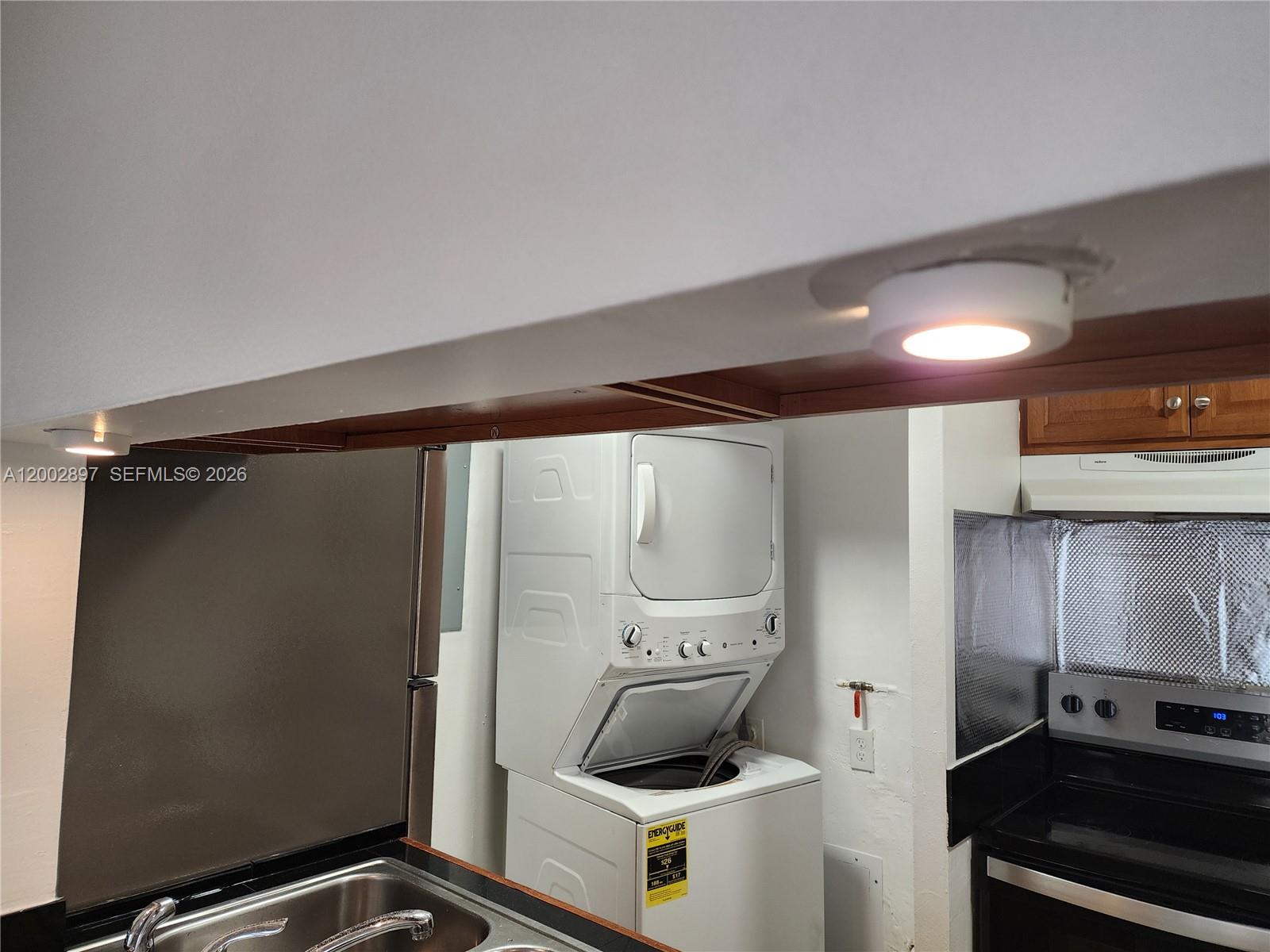 4505 Treehouse Lane, Unit 8H Tamarac, FL 33319 - Photo 26 of 29 a room with storage and utility
