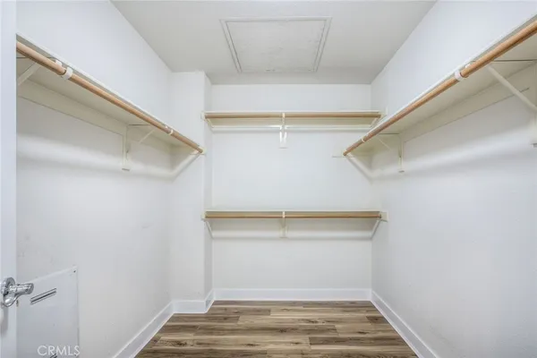 a view of an empty walk in closet