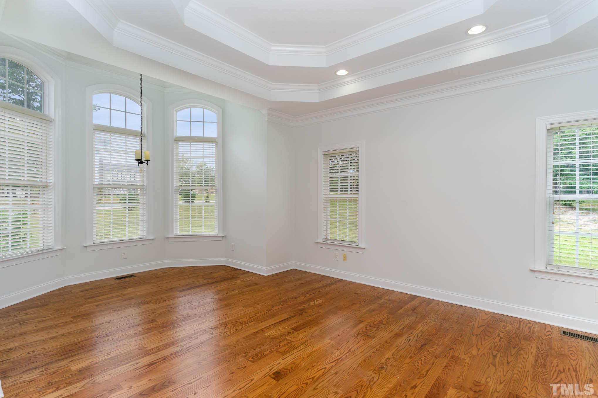 320 Government Road Clayton, NC 27520 - Photo 17 of 48 a view of an empty room with a window