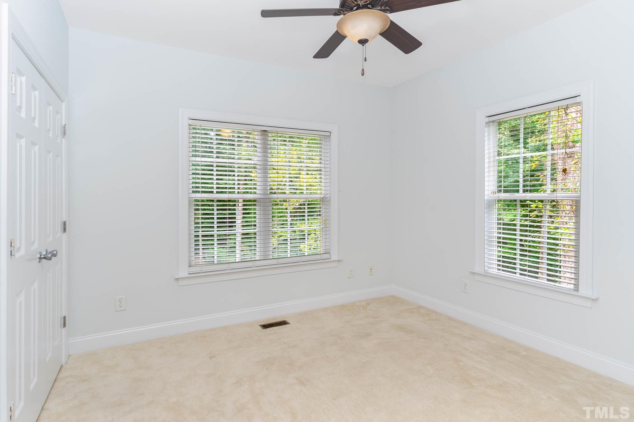 320 Government Road Clayton, NC 27520 - Photo 23 of 48 a view of an empty room with a window
