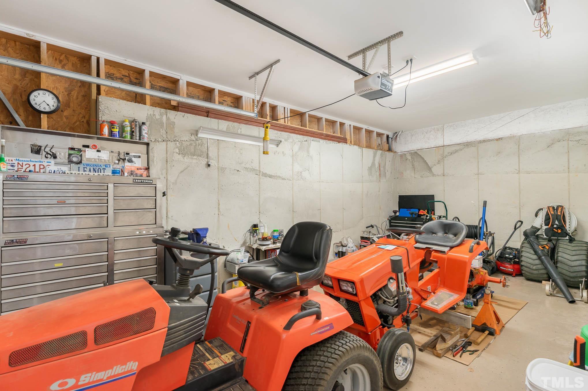 320 Government Road Clayton, NC 27520 - Photo 35 of 48 a blue bed sitting in a room next to a window