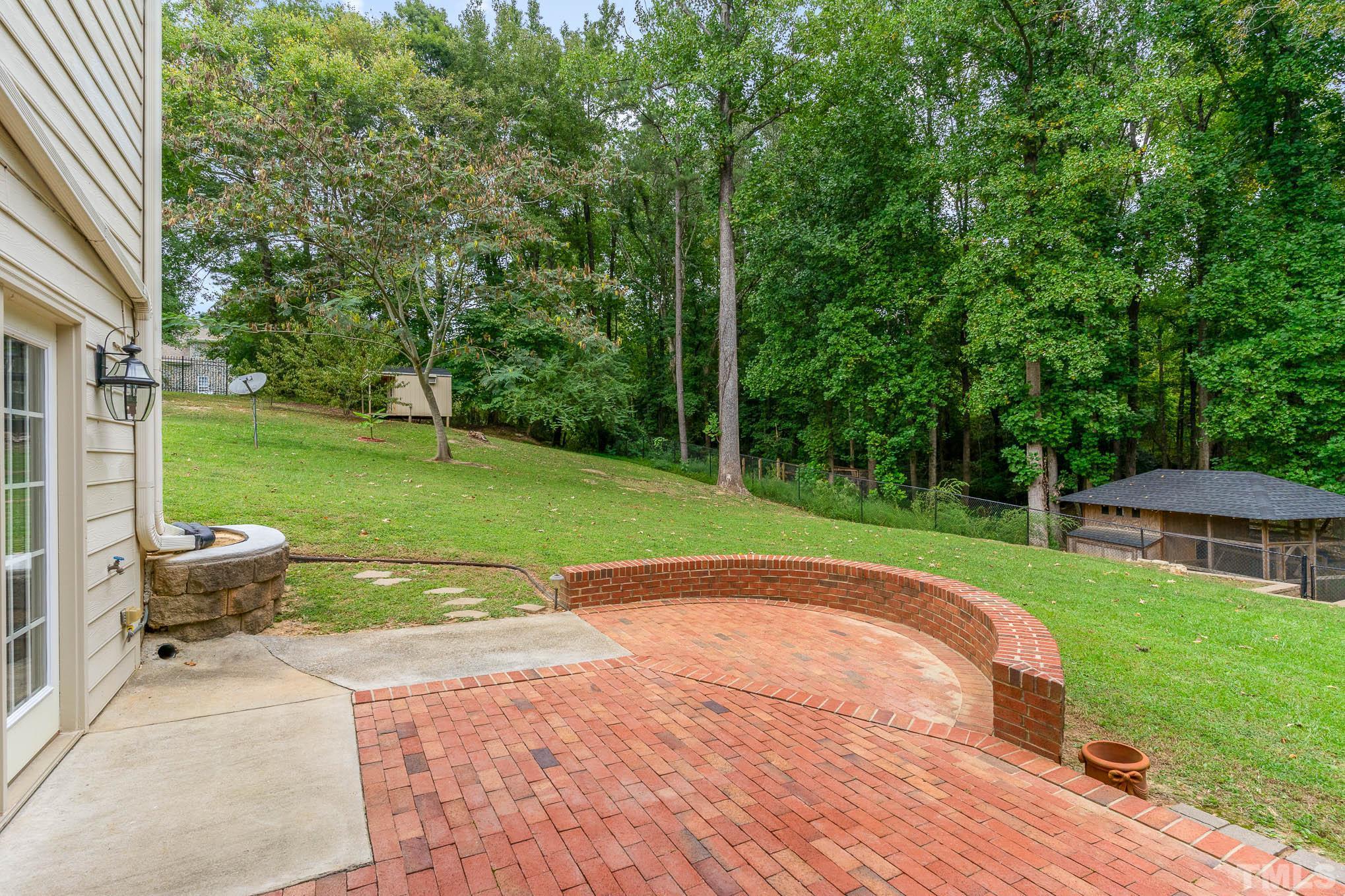 320 Government Road Clayton, NC 27520 - Photo 41 of 48 a view of a patio with a yard