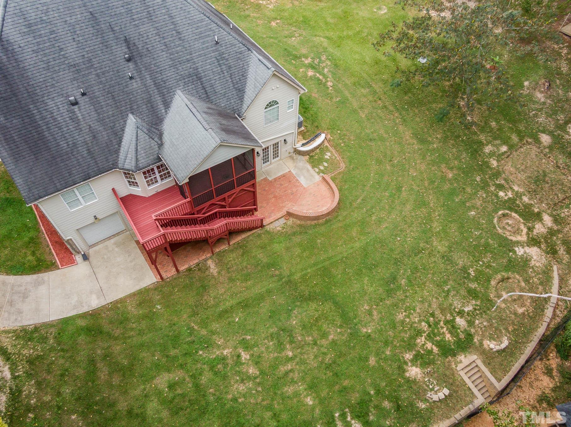 320 Government Road Clayton, NC 27520 - Photo 46 of 48 swimming pool with a yard