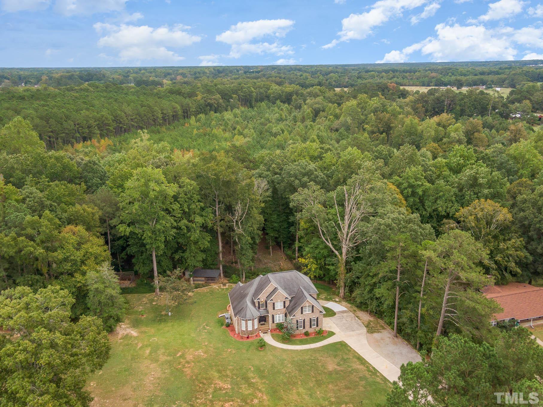 320 Government Road Clayton, NC 27520 - Photo 6 of 48 a view of a wooden floor and a yard