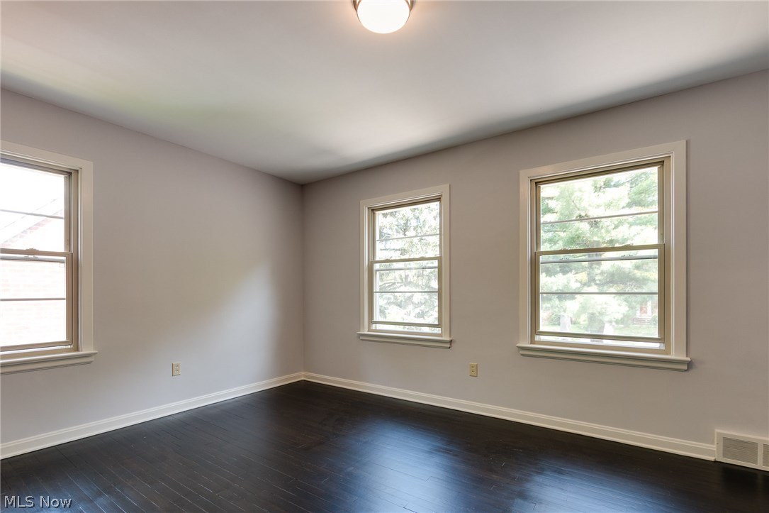 1046 Allston Road Cleveland Heights, OH 44121 - Photo 25 of 34 Plenty of natural light and cross breezes in the third bedroom. Re-stained floors match the main floors.