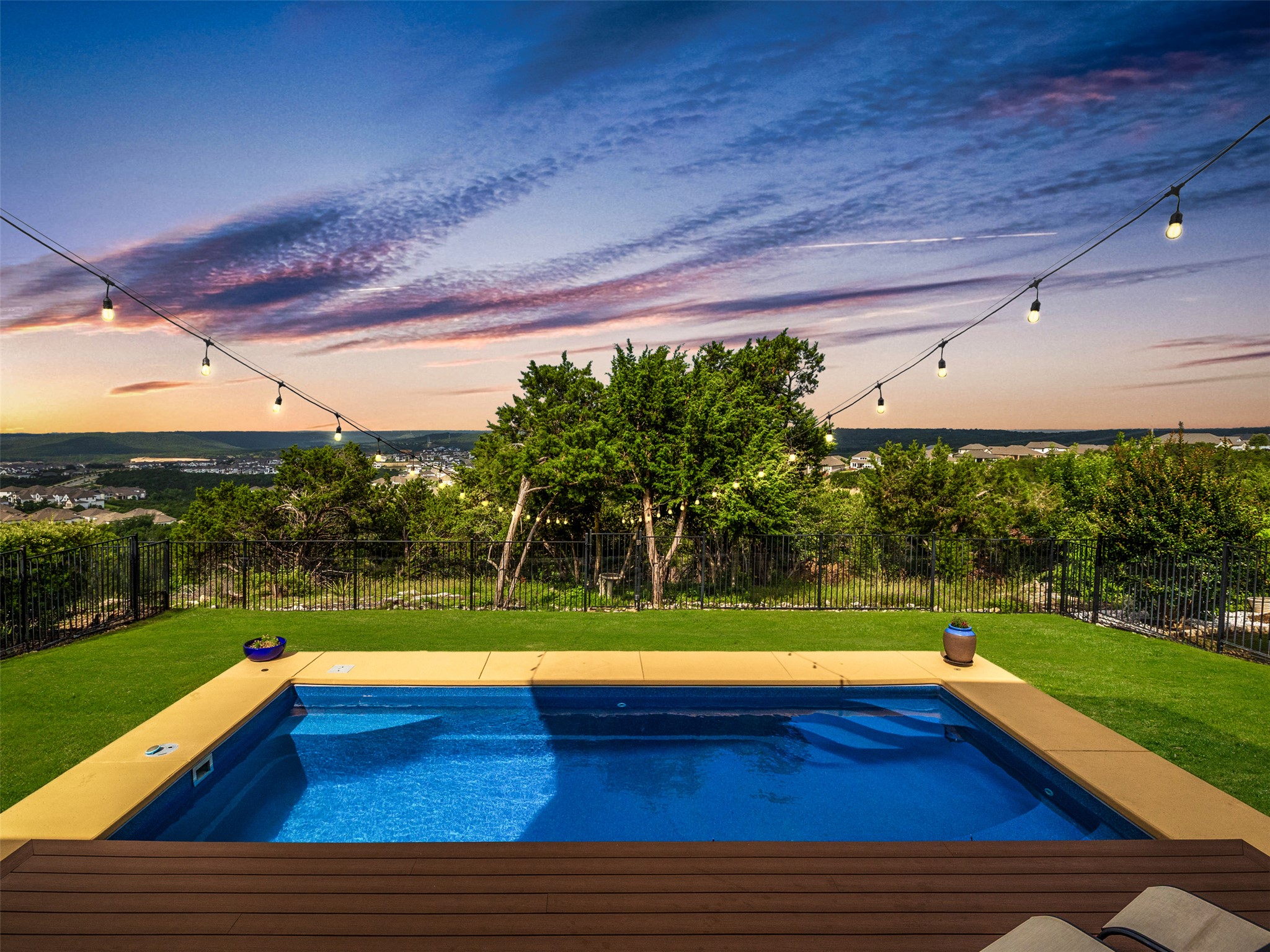 1329 Siena Sunset Road Leander, TX 78641 - Photo 2 of 40 The backyard features a pool and gorgeous views