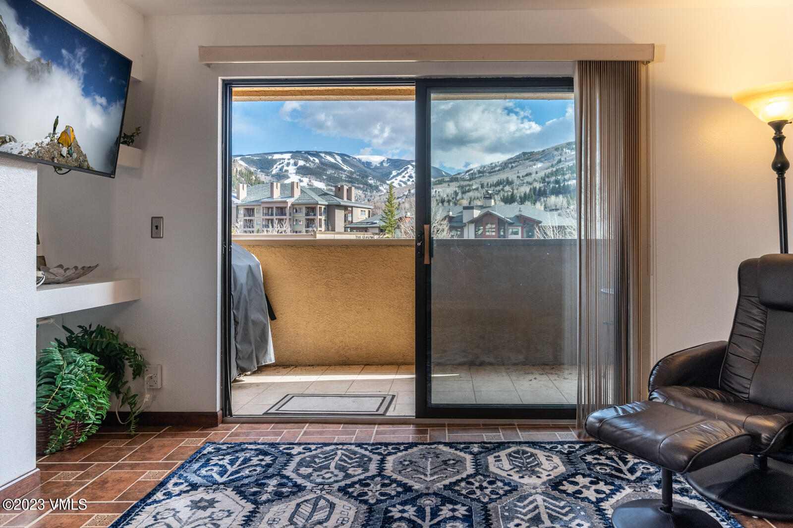 137 Benchmark Road, Unit 209 Avon, CO 81620 - Photo 2 of 20 a view of room with window and hallway