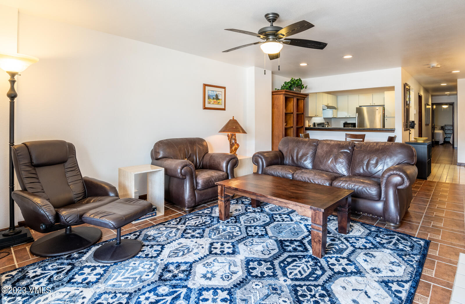 137 Benchmark Road, Unit 209 Avon, CO 81620 - Photo 4 of 20 a living room with furniture and a rug