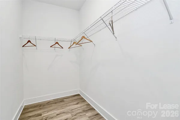 a view of a room with racks on the wall