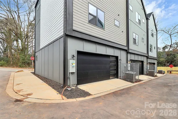a view of a house with a garage