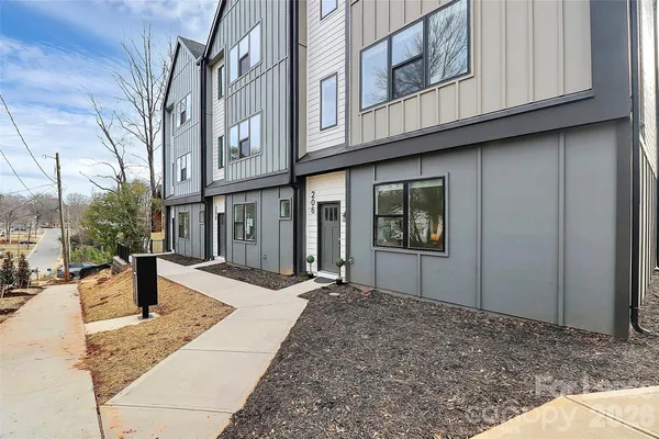 a view of houses with a city street