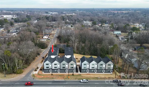 an aerial view of house with yard