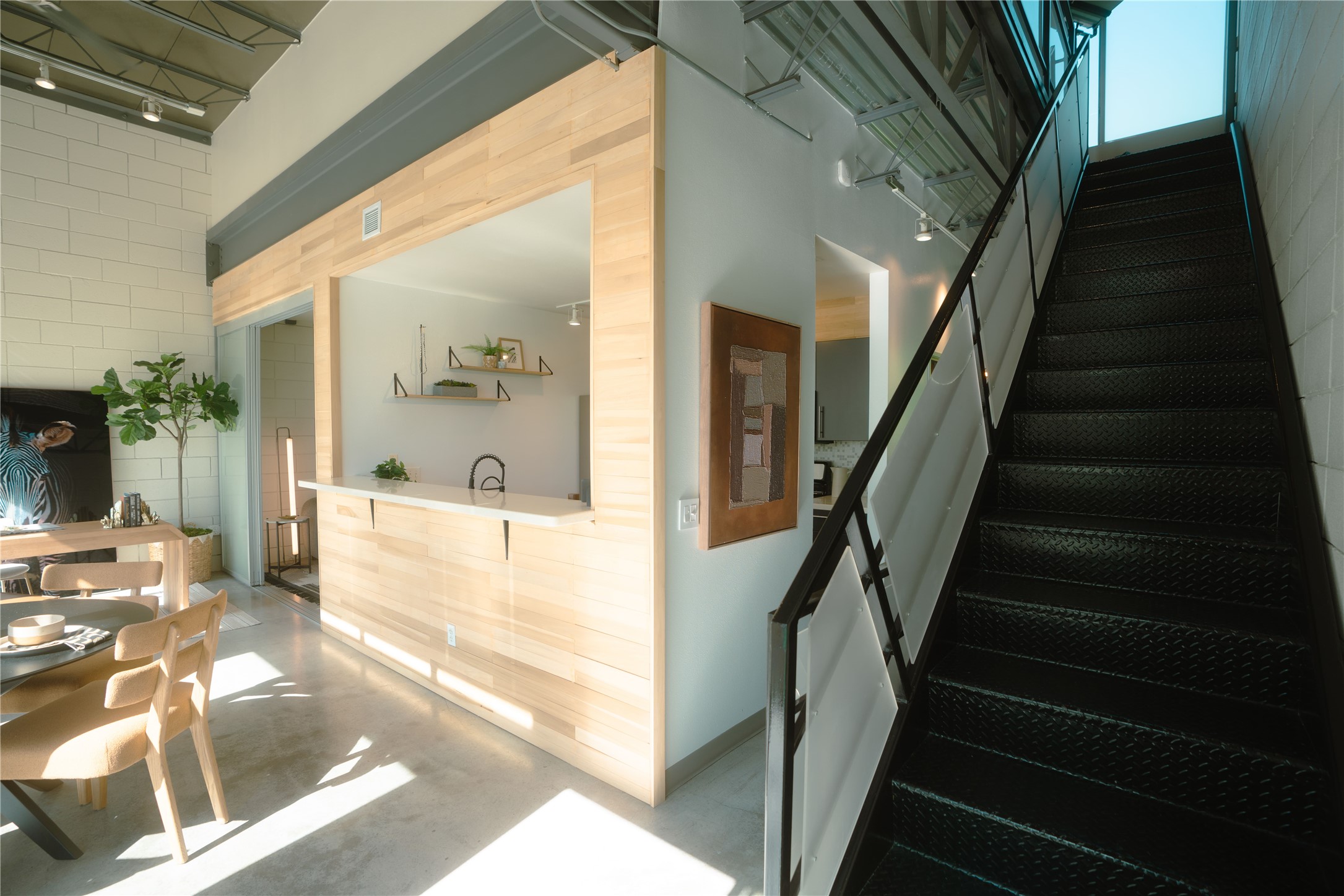 4801 South Congress Avenue, Unit H5 Austin, TX 78745 - Photo 7 of 39 Stairs featuring concrete flooring
