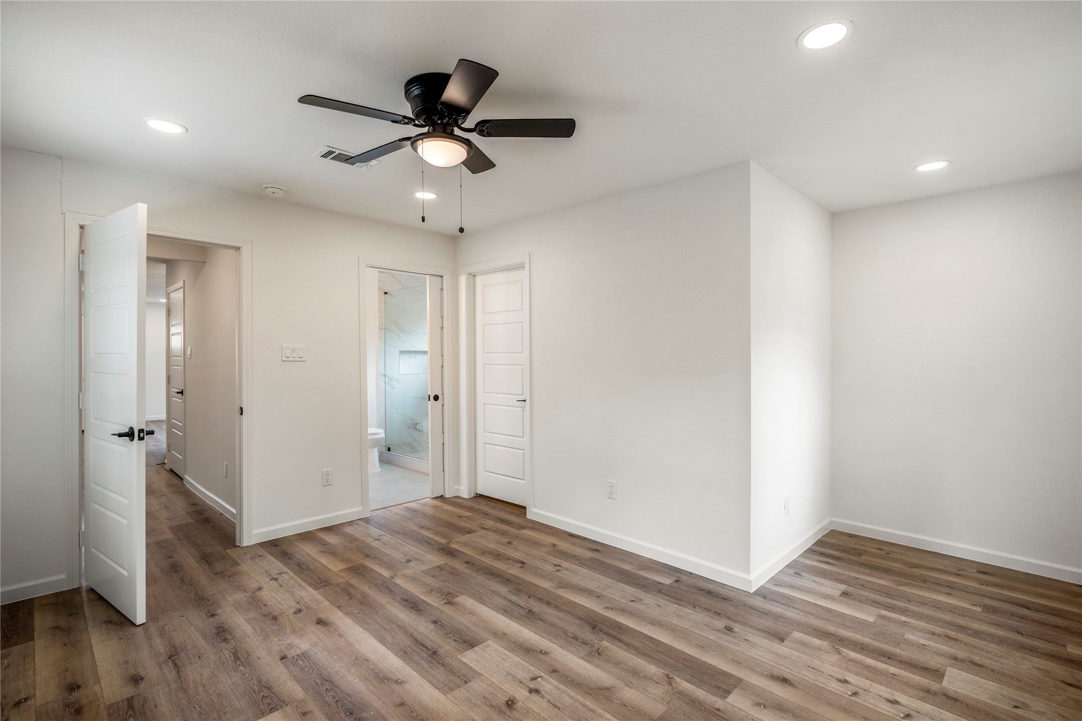 3923 Alsace Street Houston, TX 77021 - Photo 14 of 28 a view of empty room with wooden floor