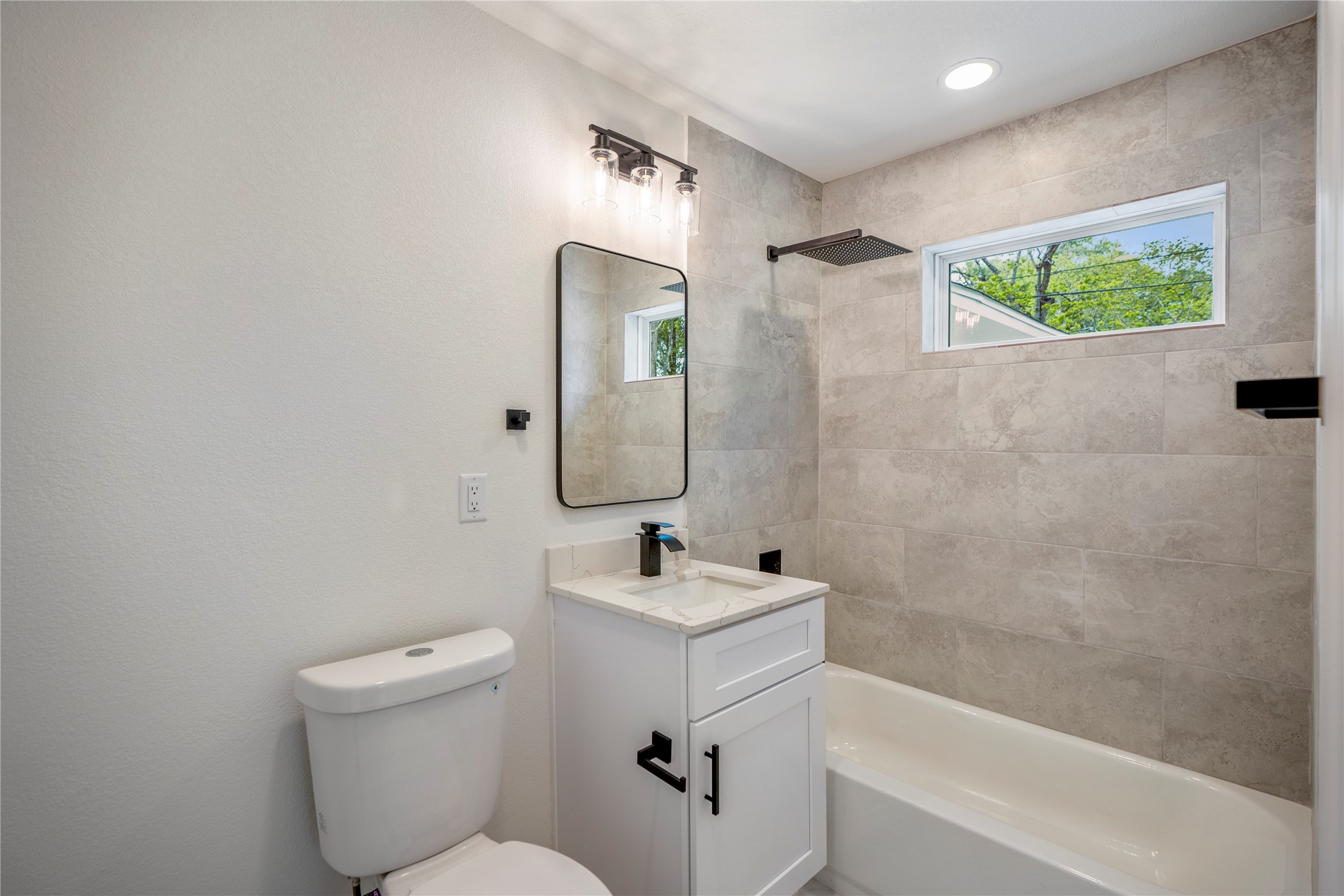 3923 Alsace Street Houston, TX 77021 - Photo 24 of 28 a bathroom with a sink a toilet and shower