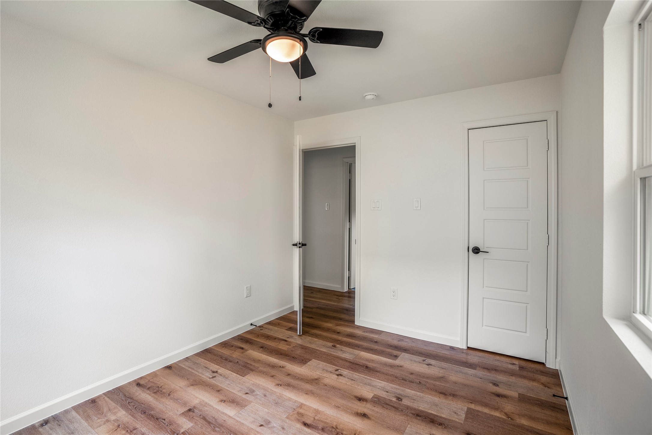 3923 Alsace Street Houston, TX 77021 - Photo 27 of 28 wooden floor in an empty room