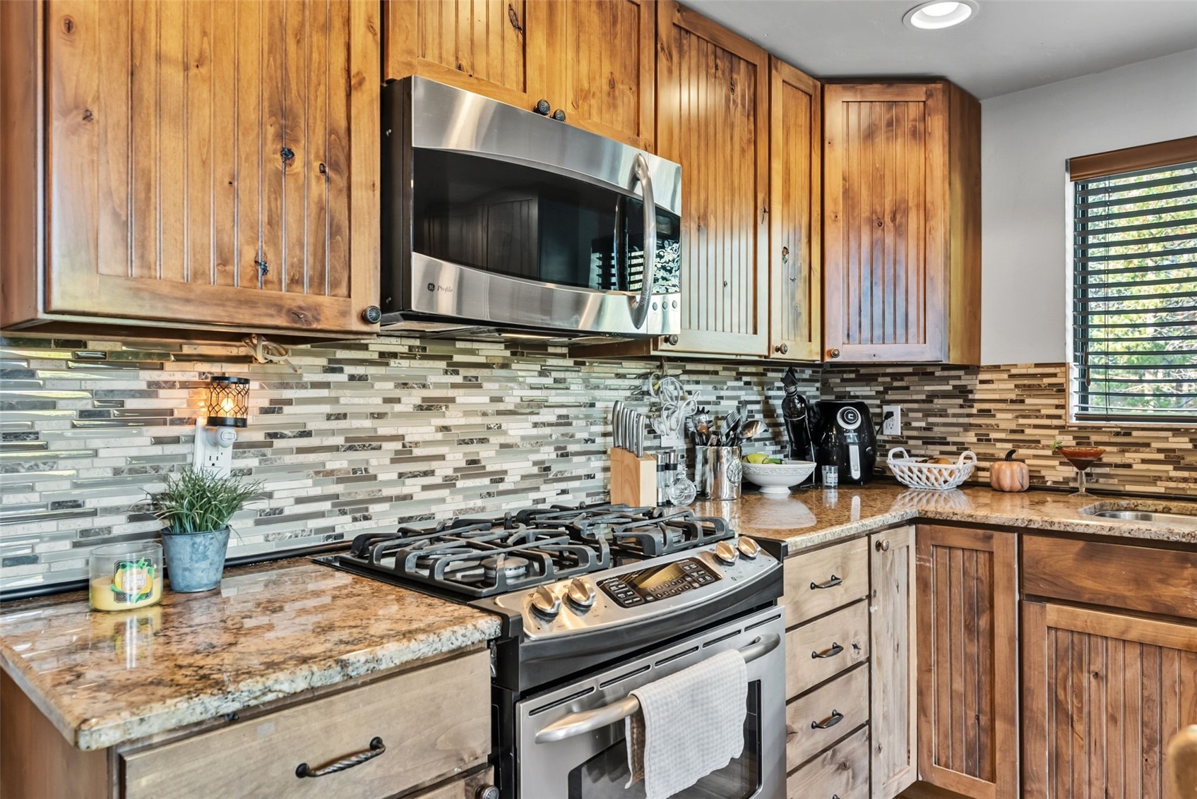 511 Vail Circle Dillon, CO 80435 - Photo 13 of 47 a kitchen with a stove and a sink