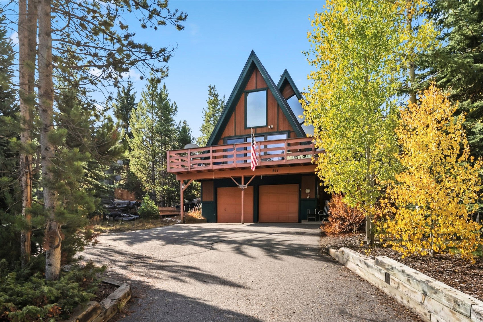 511 Vail Circle Dillon, CO 80435 - Photo 2 of 47 a front view of a house with a garden