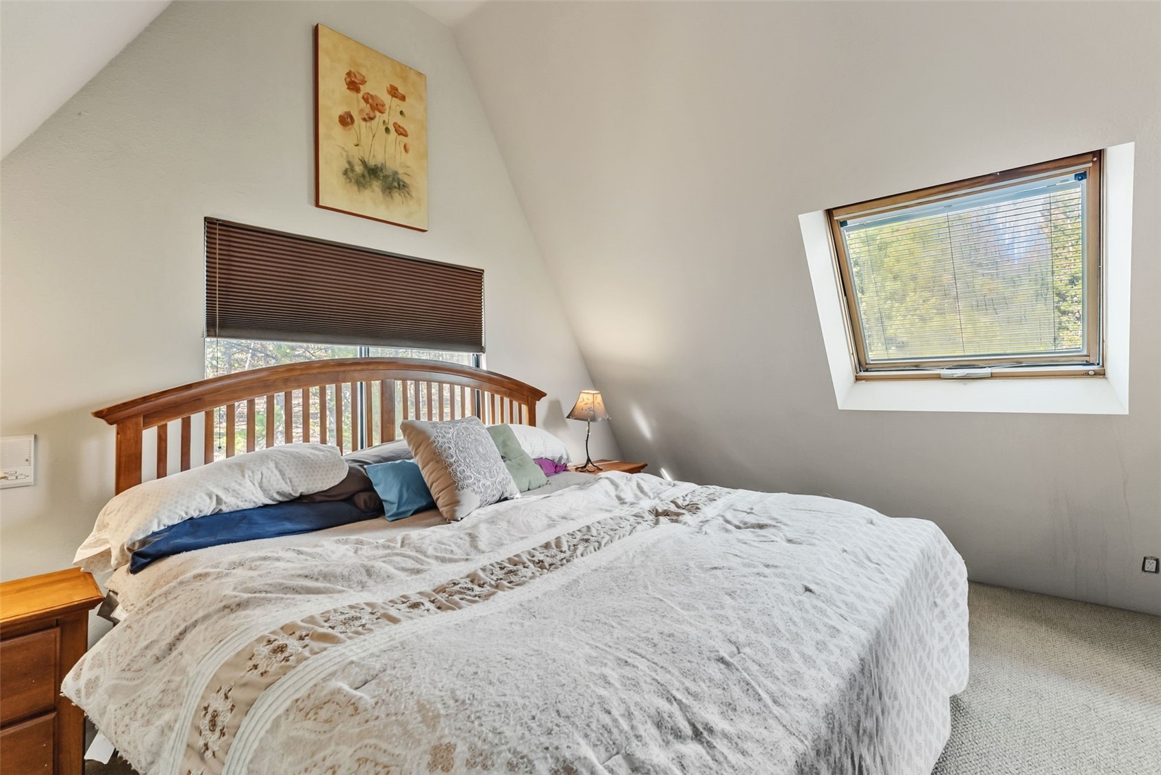 511 Vail Circle Dillon, CO 80435 - Photo 21 of 47 a bedroom with a bed and a window
