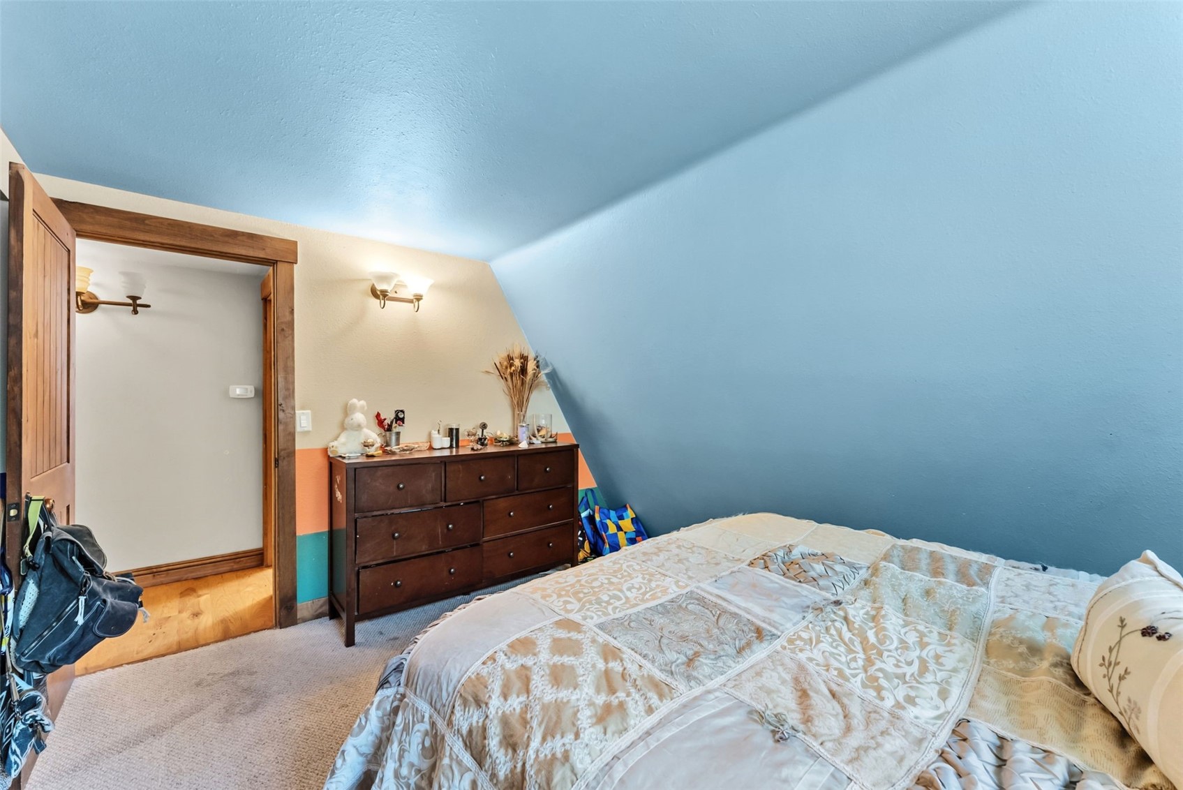 511 Vail Circle Dillon, CO 80435 - Photo 42 of 47 a bedroom with a bed and a dresser