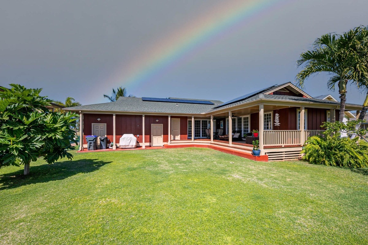 4526 Alae Road, Unit A Kekaha, HI 96752 - Photo 21 of 26 front view of a house with a garden