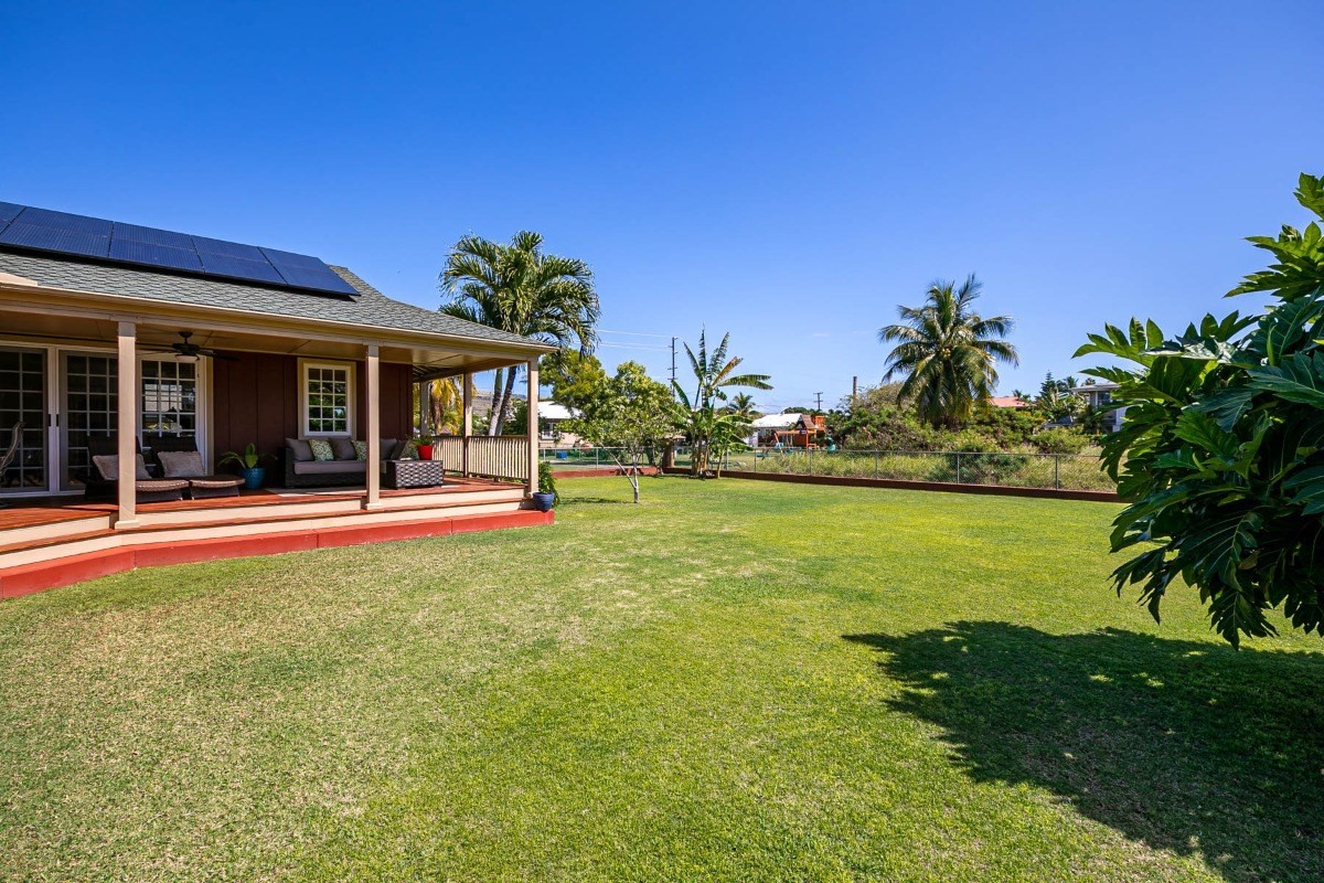 4526 Alae Road, Unit A Kekaha, HI 96752 - Photo 22 of 26 a swimming pool with outdoor seating and garden