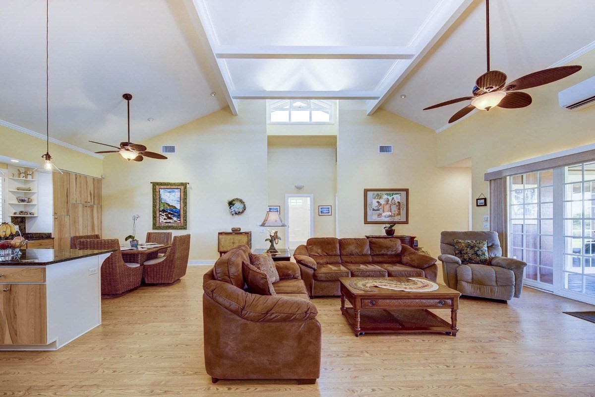 4526 Alae Road, Unit A Kekaha, HI 96752 - Photo 5 of 26 a living room with furniture ceiling fan and a rug