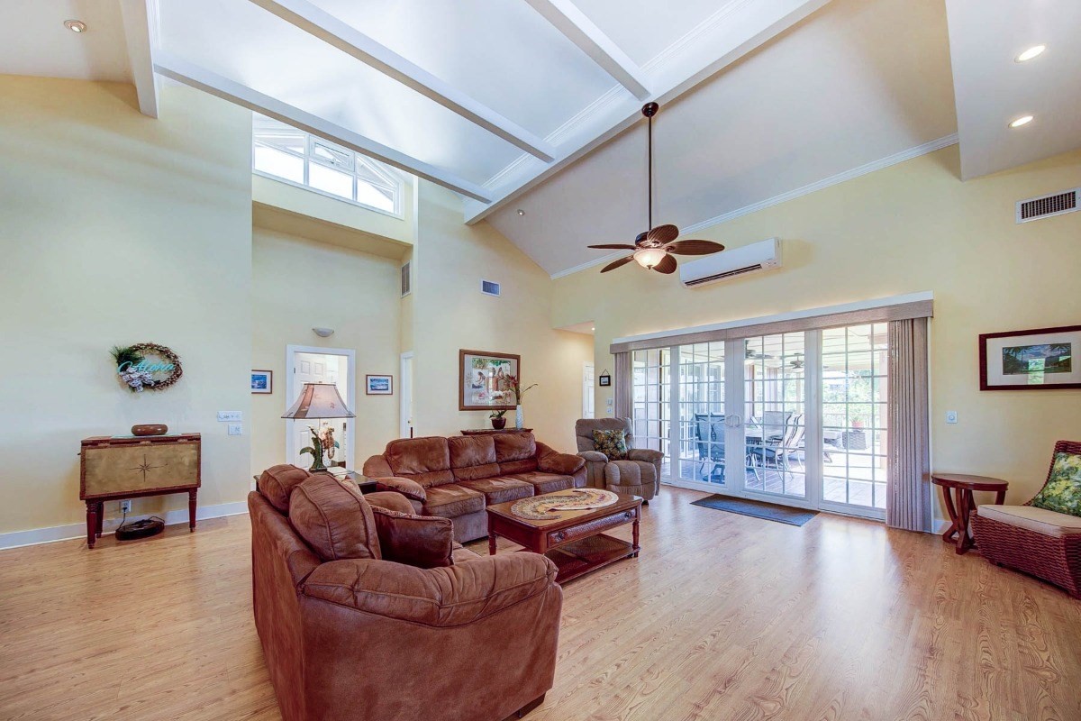 4526 Alae Road, Unit A Kekaha, HI 96752 - Photo 7 of 26 a living room with furniture and wooden floor