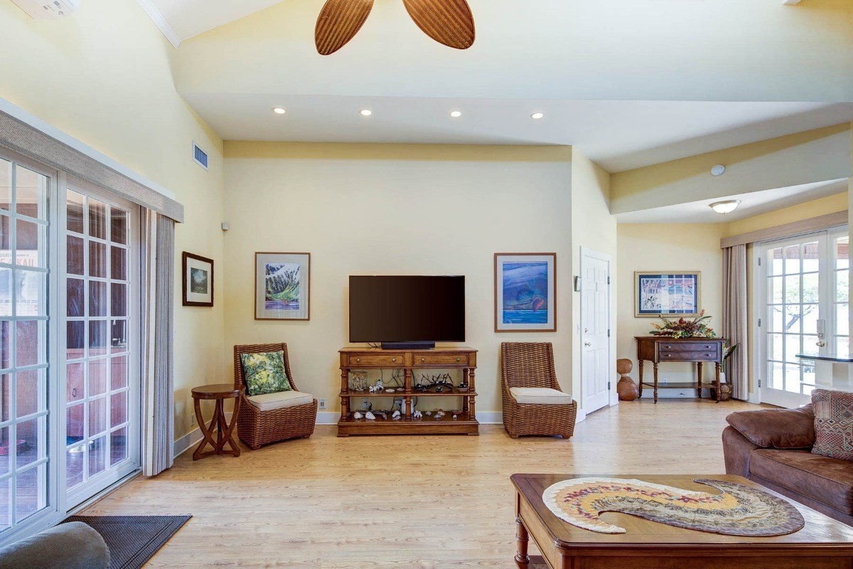 4526 Alae Road, Unit A Kekaha, HI 96752 - Photo 8 of 26 a living room with furniture and a flat screen tv