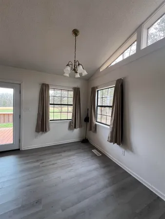 a kitchen with kitchen island a counter space a sink and appliances