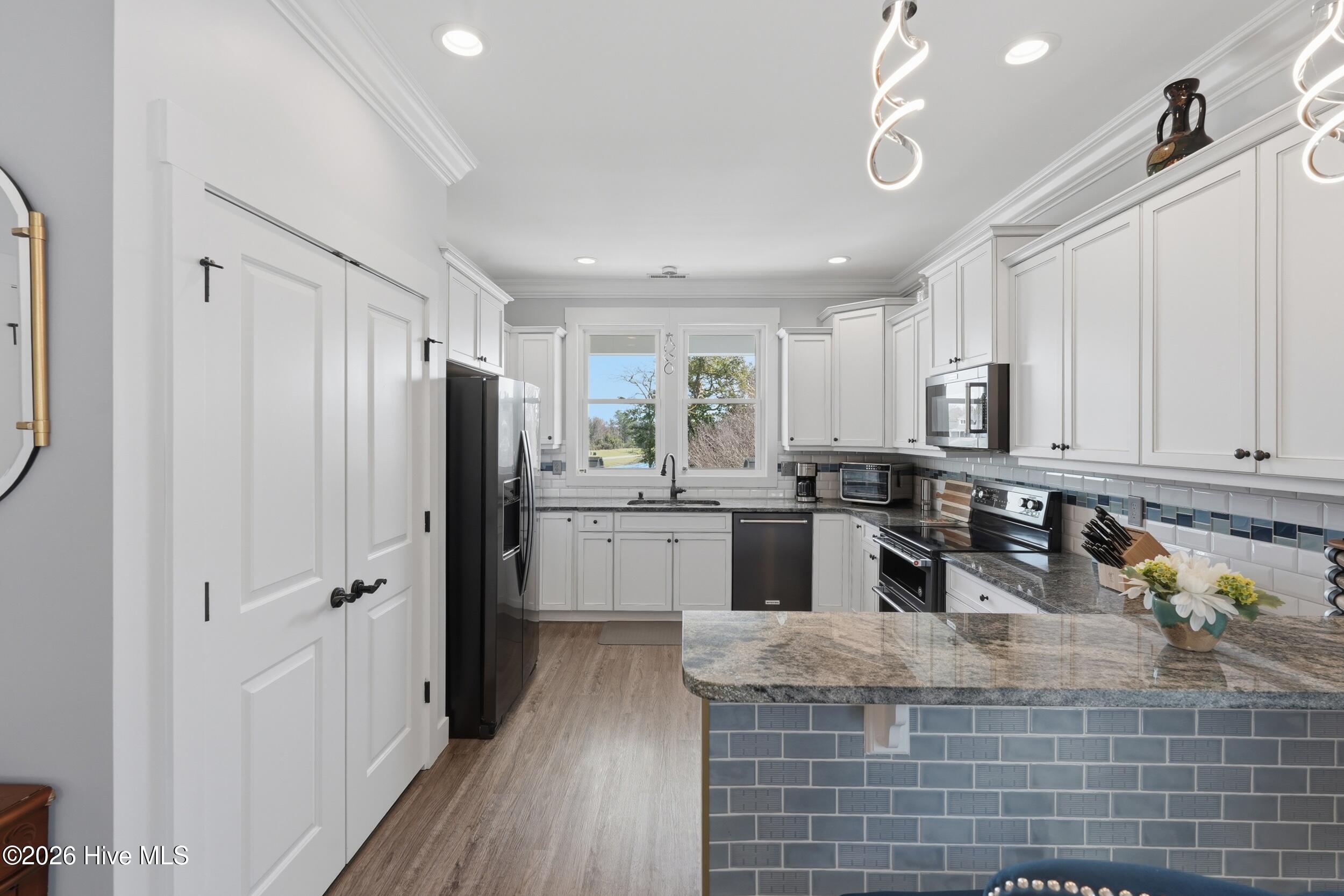 131 Everett Park Trail Holly Ridge, NC 28445 - Photo 26 of 120 Kitchen Straight-On