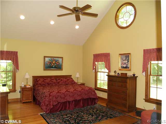 7921 Deer Run Road New Kent, VA 23124 - Photo 6 of 12 Master Bedroom - Cathedral Ceiling and Hardwood Fl