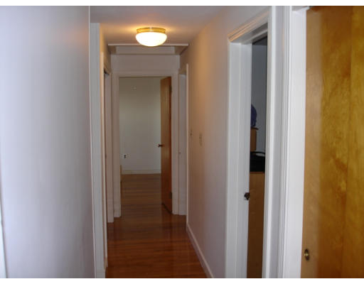 25 Squire Road Winchester, MA 01890 - Photo 11 of 12 a view of a bathroom from a hallway
