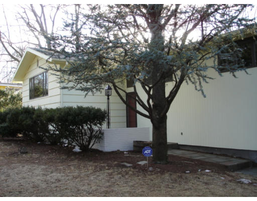 25 Squire Road Winchester, MA 01890 - Photo 4 of 12 a view of a house with a tree