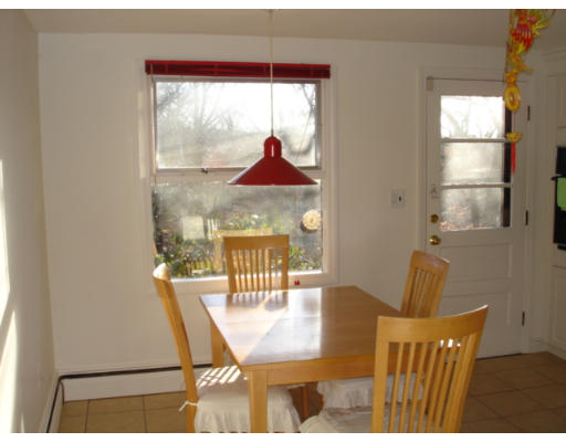 25 Squire Road Winchester, MA 01890 - Photo 8 of 12 a view of a dining room with furniture and window