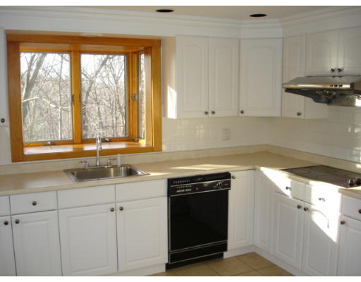25 Squire Road Winchester, MA 01890 - Photo 9 of 12 a kitchen with a sink and large window
